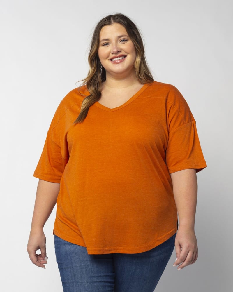 Front of a model wearing a size 2X V-Happy Jersey in Burnt Orange by chicka-d. | dia_product_style_image_id:289447